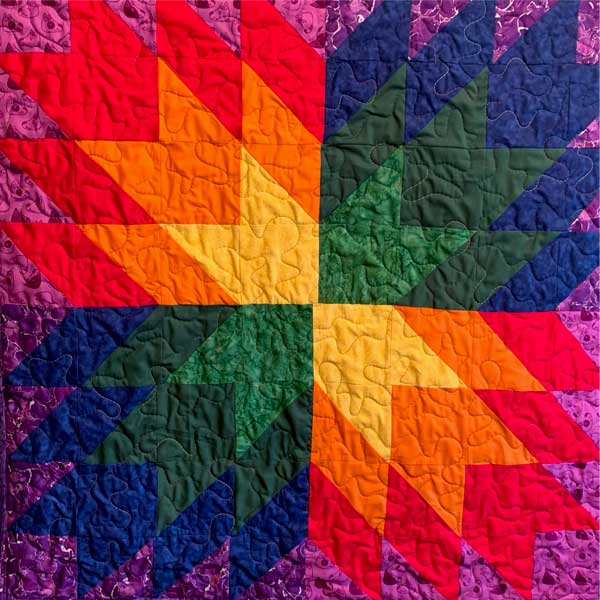 bright multicolored quilt block