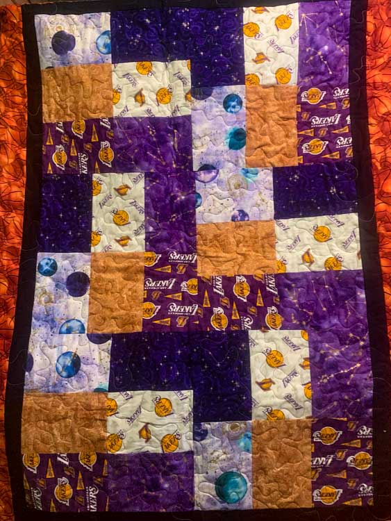 purple and orange block quilt